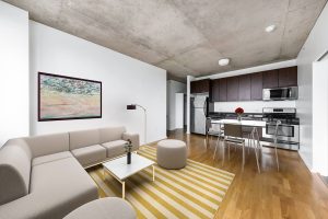 Kitchen and living room after custom virtual staging.